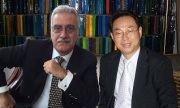 Lord Edwin E. Hitti with Beijing Official